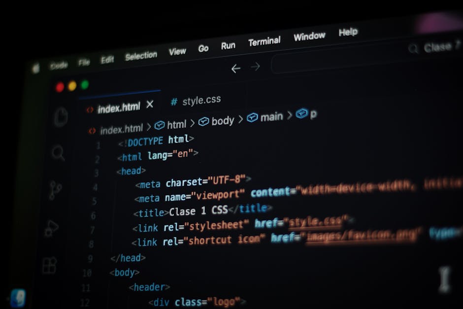A close-up view of a computer screen displaying HTML code with colorful syntax highlighting, including tags and attributes related to web development. The code features elements such as <h1> headers,